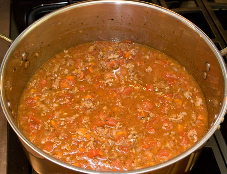Bolognese Sauce Simmering on the Stove