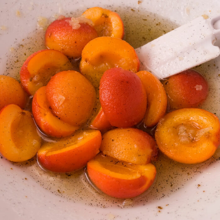 Cut apricots and flavorings for Apricot Ginger Peasant Cake