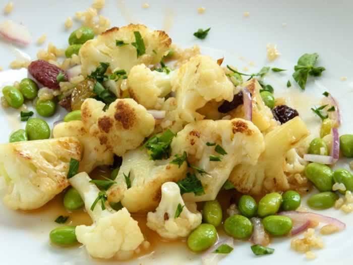 Warm Cauliflower Salad with Edamame & Raisins